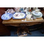 A VICTORIAN ROSEWOOD FOLD TOP CARD TABLE with carved frieze and base, 92cm wide