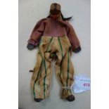 A VINTAGE 'GOOFY' with a carved wooden head, hands and feet, circa 1930s