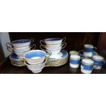 A COLLECTION OF WEDGWOOD BLUE AND GILT EDGED DINNERWARES