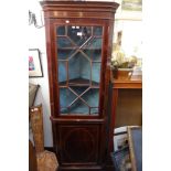 AN EDWARDIAN MAHOGANY AND LINE INLAID CORNER CABINET circa 1910 the simulated dentil cornice above