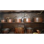 A COLLECTION OF ANTIQUE AND MODERN FRENCH COPPER SAUCEPANS