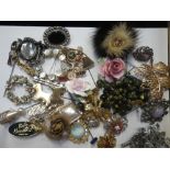 A COLLECTION OF COSTUME BROOCHES, including one decorated with fur and central gem set flower