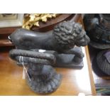 A VICTORIAN CAST IRON DOOR STOP and another in the form of a lion