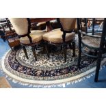 A CREAM GROUND CIRCULAR PERSIAN STYLE RUG, 244cm diam (plus fringes)