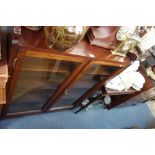 AN EDWARDIAN MAHOGANY SIDE TABLE, 72cm wide and a bookcase (2)