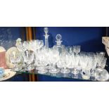 A COLLECTION OF DRINKING GLASSES and decanters