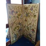 A VINTAGE TWO-FOLD SCREEN with crewelwork panels, 156cm high