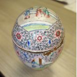 A CANTONESE ENAMELLED METAL EGG WITH ALLOVER DECORATION, on a later stand (examine)15 cm high