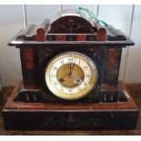 A VICTORIAN BLACK SLATE AND ROUGE MARBLE MANTEL CLOCK striking on a gong