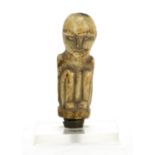 Tribal interest bone carving raised on a later square perspex base, 7cm high : For Extra Condition