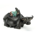 Large Chinese porcelain model of a boy and water buffalo, 39cm wide : For Extra Condition Reports