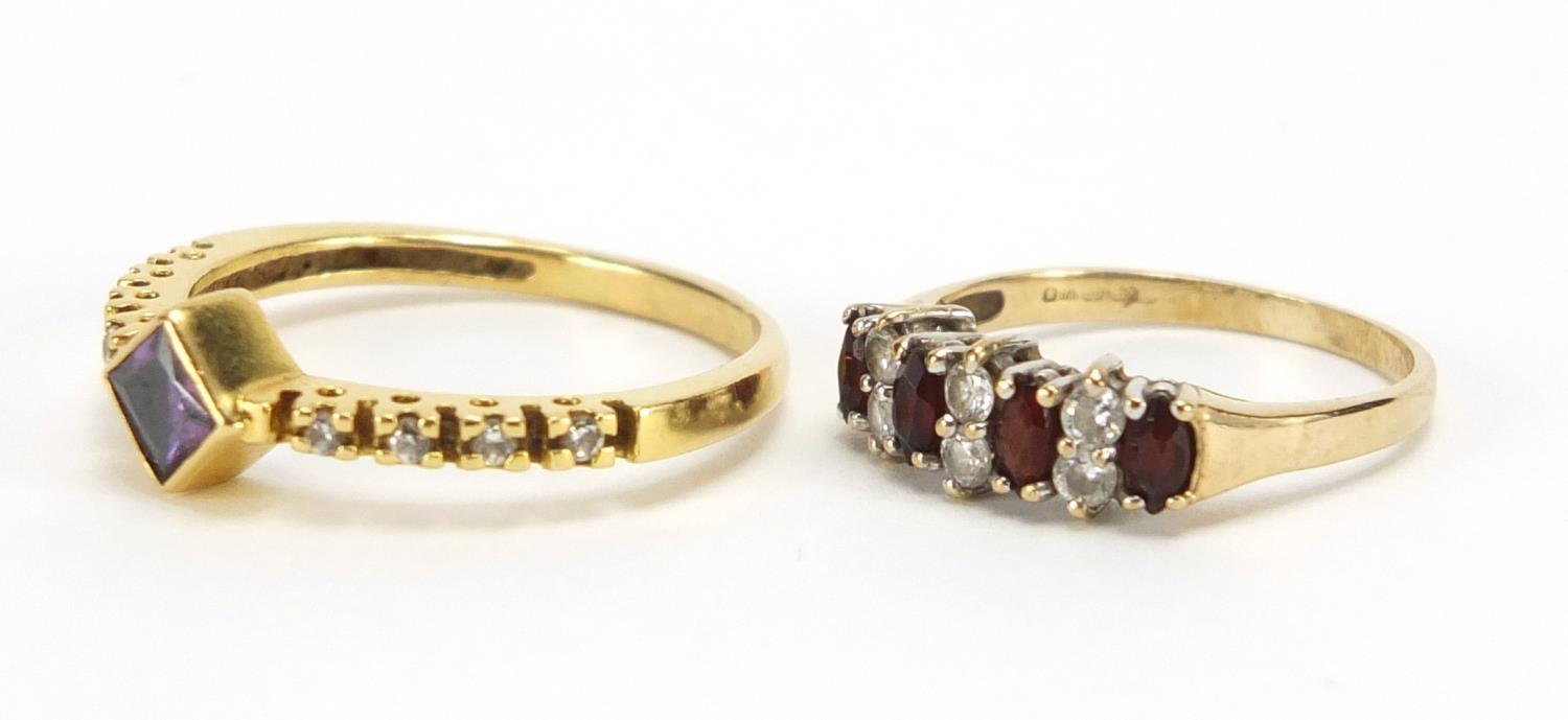 Two 9ct gold rings set with garnet and clear stones, sizes R and J, approximate weight 4.4g : For