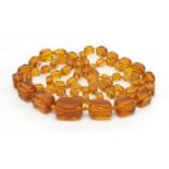 Amber coloured graduated bead necklace, 80cm in length, approximate weight 67.0g : For Extra