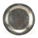 Islamic unmarked silver dish, engraved with script and foliate motifs, 23cm in diameter, approximate