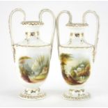 Pair of Early 19th century porcelain vases with twin handles, each hand painted with pastoral