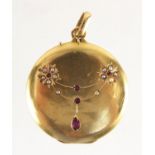 Victorian unmarked gold ruby and seed pearl locket, 3cm in diameter, approximate weight 6.1g : For