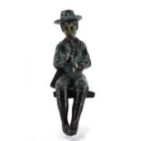 Bronzed study of a boy seated playing a flute, 34.5cm high : For Extra Condition Reports Please