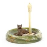 Green onyx, ivory and cold painted bronze model of a terrier beside a lamppost, 11cm high : For
