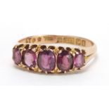 9ct gold garnet five stone ring, size O, approximate weight 2.3g : For Extra Condition Reports