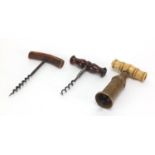 Three 19th century corkscrews including an example with bone handle and brass barrel : For Extra