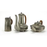 Tudric pewter coffee pot, teapot and jug, each with impressed marks and numbered to the bases, the