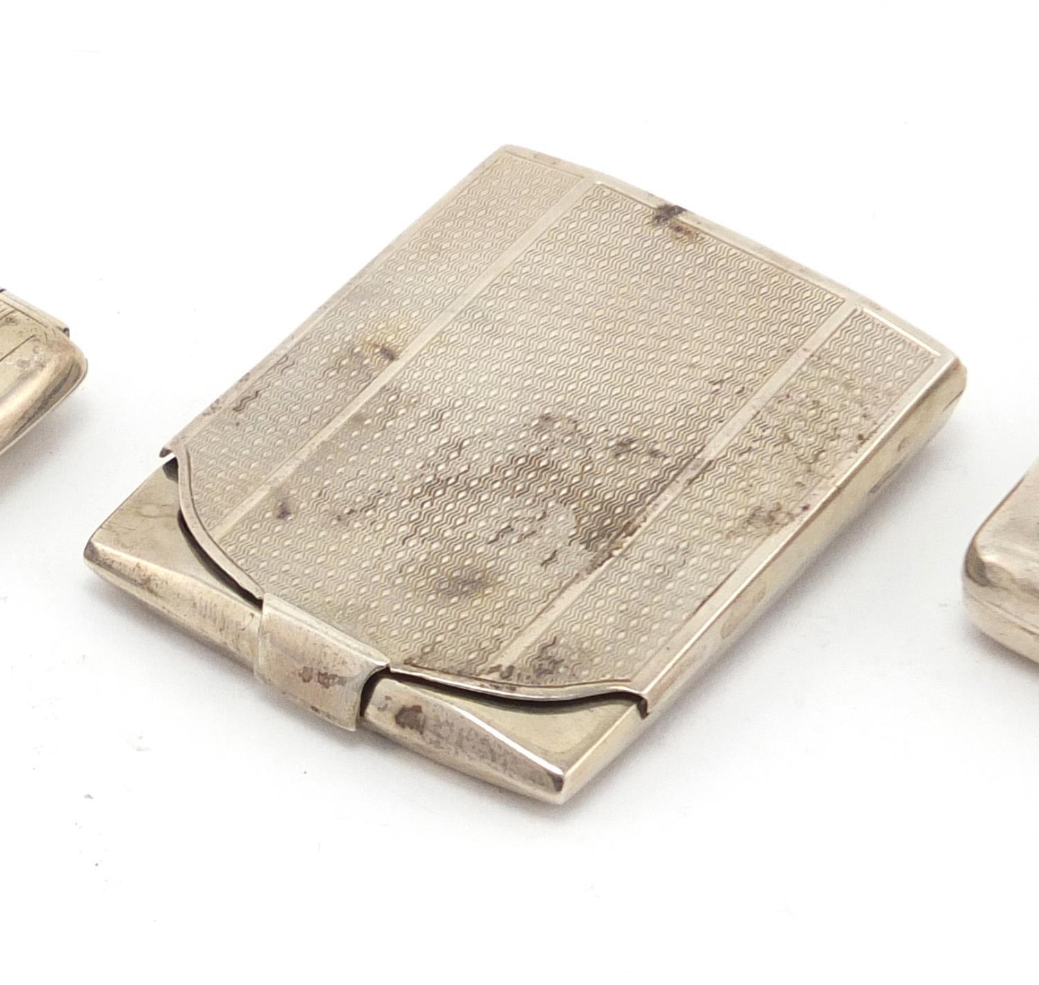Five rectangular silver match cases some with engine turned decoration, various Birmingham - Image 2 of 8
