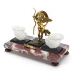 Marble and black slate desk stand mounted with a gilt metal putti, 22cm wide : For Extra Condition