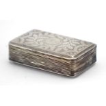 Georgian silver snuff box, the hinged lid with floral chased decoration and gilt interior,