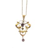 Art Nouveau 9ct gold garnet pendant on a 9ct gold necklace, the pendant 4.5m in length,