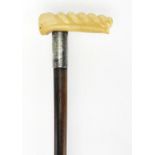 Ivory handled walking stick with silver collar having an engraved presentation inscription, 93cm