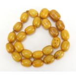 Amber coloured bead necklace, 56cm in length, approximate weight 146.5g : For Extra Condition