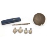 Silver objects comprising circular compact, Yard-O-Led propelling pencil and four sports jewels,