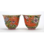Pair of Chinese porcelain dragon and phoenix fluted tea cups, each finely hand painted in the