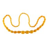 Butterscotch amber coloured bead necklace, 82cm in length, approximate weight 73.8g : For Extra