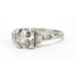 Platinum diamond solitaire ring, with diamond set shoulders, size N, approximate weight 3.3g : For