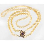 Simulated pearl two string necklace, with 9ct gold amethyst clasp, 44cm in length, approximate