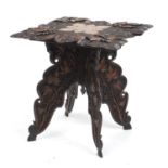 Anglo Indian folding table profusely carved with fruiting leaves, 62cm H x 60cm W x 60cm D : For