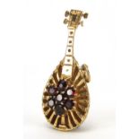 9ct gold mandolin pendant set with garnets, 4.2cm in length, approximate weight 7.9g : For Extra