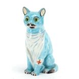 Mosanic faience pottery model of a seated cat with beaded eyes, 24cm high : For Extra Condition