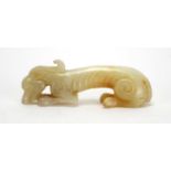 Chinese white amd russet jade carving of a mythical animal, 9cm in length : For Extra Condition