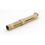 9ct gold pencil holder, 7cm in length, approximate weight 10.6g : For Extra Condition Reports Please