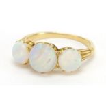 Unmarked gold cabochon opal three stone ring, size O, approximate weight 3.9g : For Extra