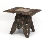 Anglo Indian hardwood folding table, profusely carved with fruiting leaves, 62cm H x 72cm W x 72cm D