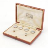 Set of 18ct gold, platinum and Mother of Pearl buttons and studs, housed in a Goldsmith's &