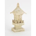 Chinese carved ivory pagoda enclosing a figure of Buddha, 25.5cm high : For Extra Condition
