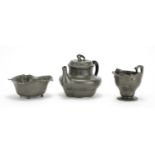 Arts & Crafts pewter three place tea set by Orivit, factory marks and numbered 2174 and 2123, the