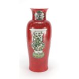 Chinese porcelain red ground vase, hand painted in the famille verte palette with four vases, teapot