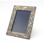 Art Nouveau silver easel photo frame, embossed with stylised flowers, by Henry Matthews Birmingham