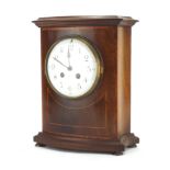 Inlaid mahogany chiming mantel clock, with enamelled dial, Arabic numerals and French movement