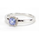18ct white gold tanzanite and diamond ring, housed in a tooled leather box, size U, approximate